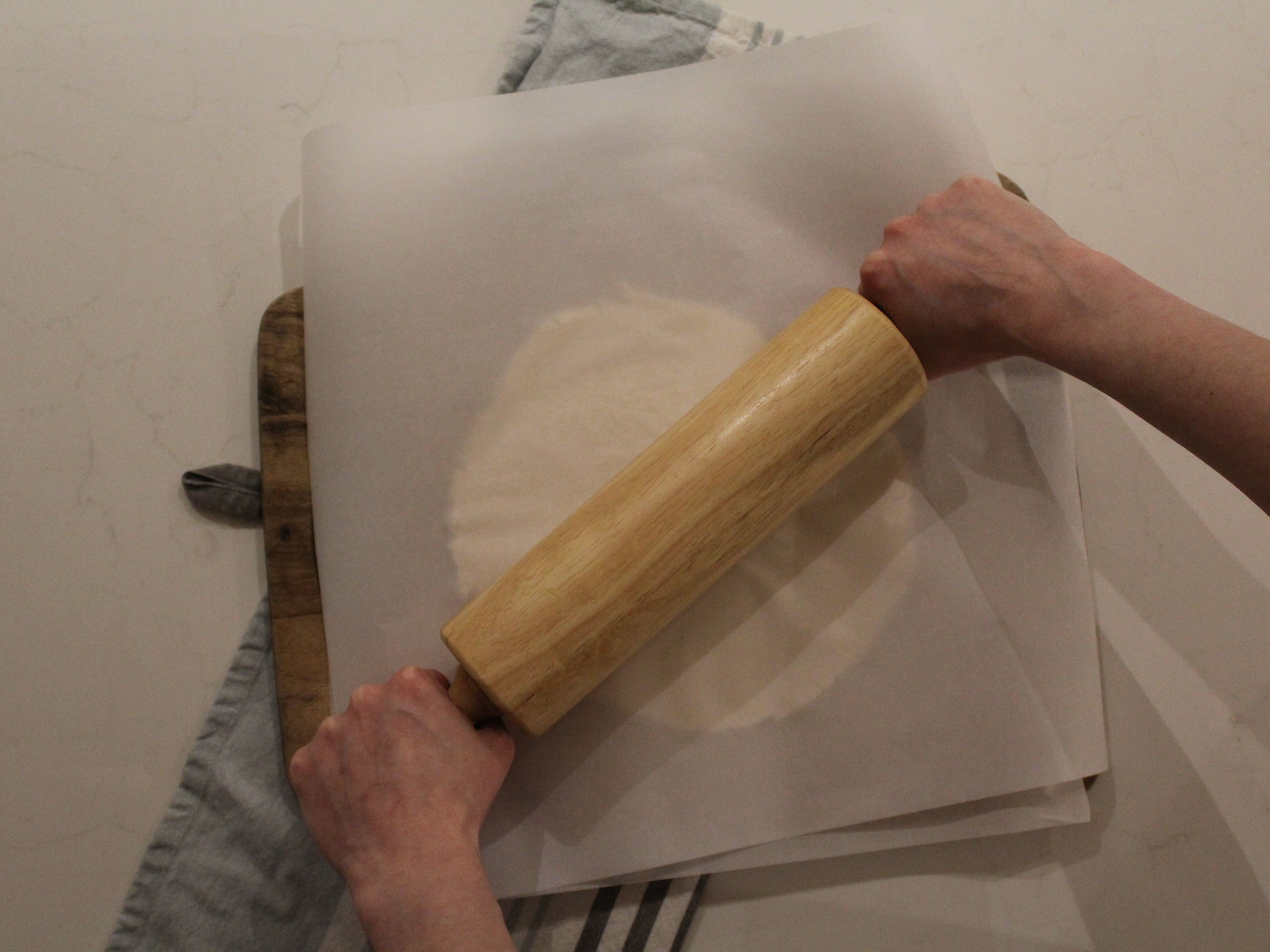 Rolling dough to make a paw print
