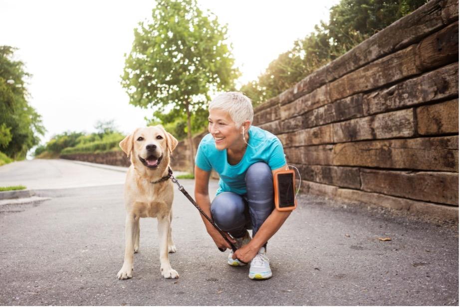 Woman exercising with dog